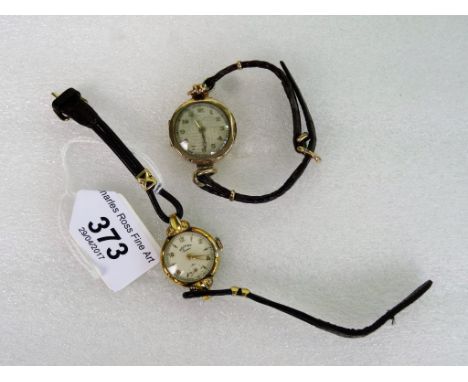 A lady's 9ct gold cased wristwatch, together with a lady's Rotary Seven wristwatch in yellow metal case, each to a leather br