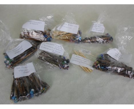 A large quantity of lace making bobbins, to include: named, tiger, butterfly, brass wired, leopard, bone and other examples.