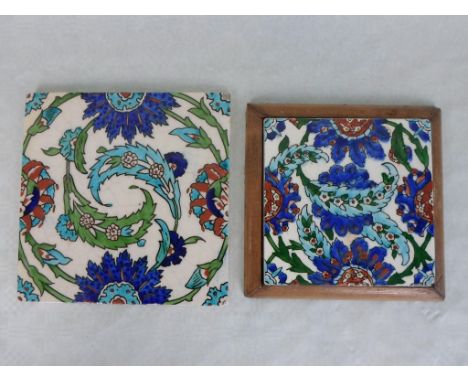 A 19th century Islamic inspired tile, decorated in polychrome enamels in a foliate pattern (20cm²), together with another, sm