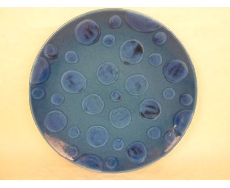 A Poole Pottery Blue Spot charger, impressed and painted marks to base (40cm diameter).