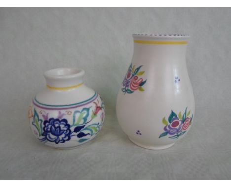 A Poole Pottery small baluster vase, having hand painted floral decoration, together with another Poole Studio vase (the tall