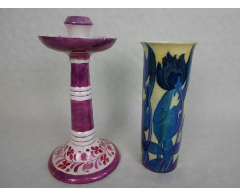An early 20th century Wood & Sons Bursley ware sleeve vase, probably designed by Frederick Rhead, having lustred blue tall fl