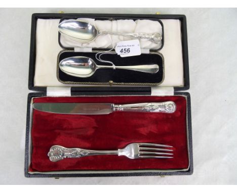 A boxed silver dessert spoon, London hallmarks, 1762, together with a boxed three piece silver set of flatware, Walker & Hall