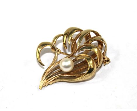 A 9 carat gold leaf brooch set with a single pearl