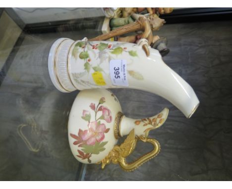 A Royal Worcester blush ivory jug with dragon handle and floral decoration, 1888,  15cm high, and a Royal Worcester tusk ice 