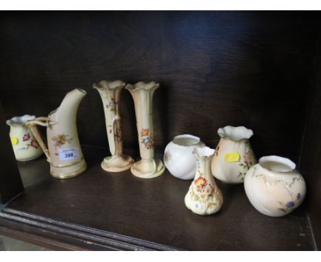 A Royal Worcester blush ivory tusk ice jug, 15cm high, a pair of spill vases 16cm high, two pairs of small vases, and two oth