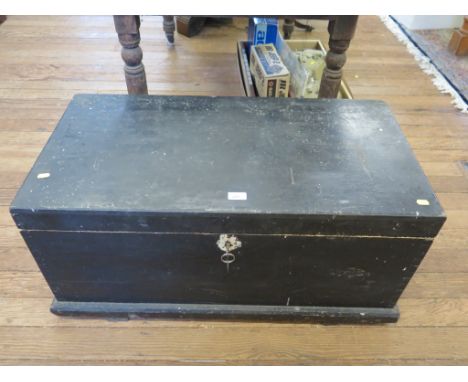 A stained pine tool chest, containing chisels, saws and other tools, chest 88cm wide