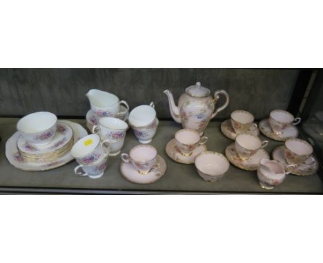A pink Tuscon china coffee service with gilt floral decoration (15 pieces), and a Queen Anne part tea service (21 pieces)