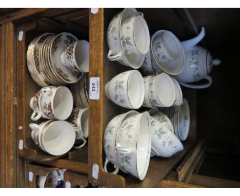 A Colclough part tea service with red and black foliate design, 32 pieces, and a Johson Bros. Snow White pattern part tea ser