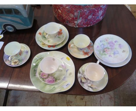 A hand painted part tea service, with floral decoration, signed C. Newall 1984 each initialled P.J.F. (16 pieces)