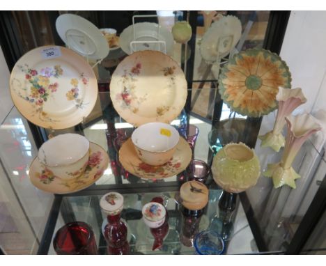 A collection of Royal Worcester blush ivory wares, including two cups, saucers and side plates, a pair of spill vases and tri