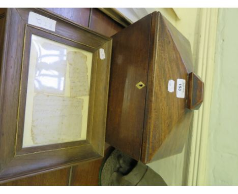 An early Victorian sarcophagus form mahogany tea caddy, with bowl and two tea compartments, 30cm wide, with a framed letter d