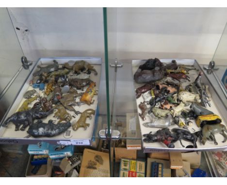A collection of painted lead farm and zoo animals, including Johillco, as found