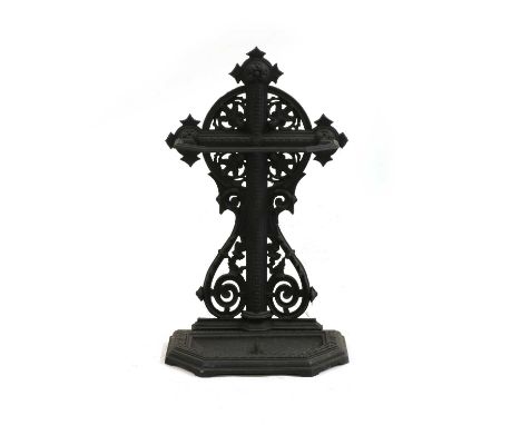 A 19th century patent cast iron stick stand, of crucifix and leaf design, complete with drip tray, registration mark verso, 4