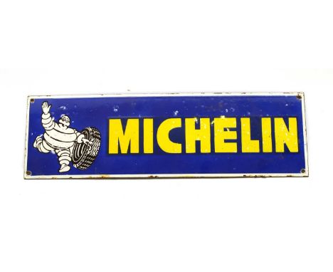 An enamel sign 'Michelin' with illustration, 15.5 x 80cmCondition report: Rusty corner holes and chipped rusty edges