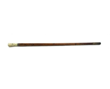 A Georgian pique walking stick, the silver and ivory handle with silver collar, on a malacca shaft. 89cm longCondition report