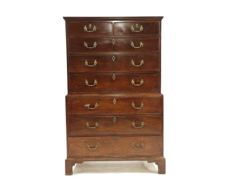 A George III Chippendale design mahogany chest on chest, the moulded cornice above two short and six long drawers, each havin