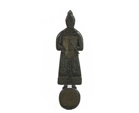 A 17th century style oak and brass mounted sundial, circa 1900, carved as a Bishop in mitre and robes, holding a sundial stan