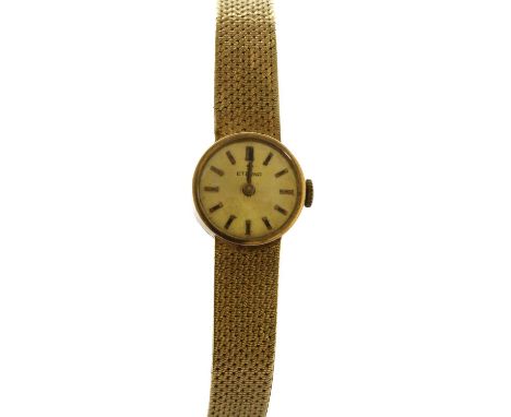 A ladies' 9ct gold Eterna mechanical bracelet watch, 17.3mm diameter with a gilt dial and baton hour markers, to integral eng