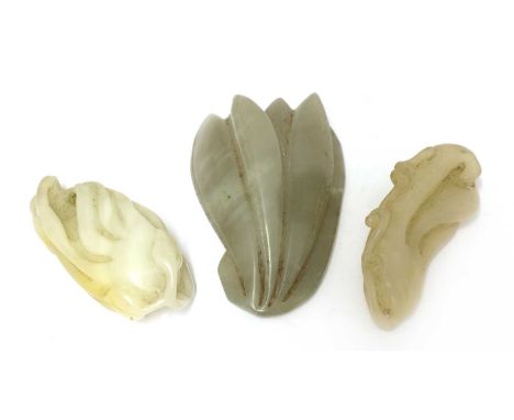 Two Chinese jade carvings, Qing dynasty (1644-1911), each in the shape of a finger citron, the stone of white or greyish-whit