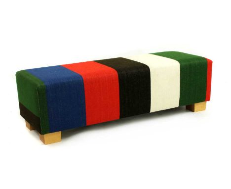 A contemporary pouffe, 140cm wide, 50cm deep, 42cm high