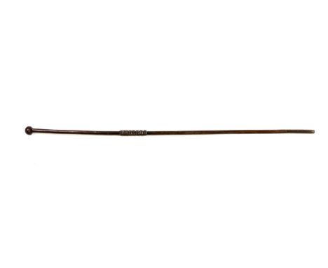 An African turned hardwood walking stick, 128cm high and a boomerang, possibly 19th century, 59cm longCondition report: No ob