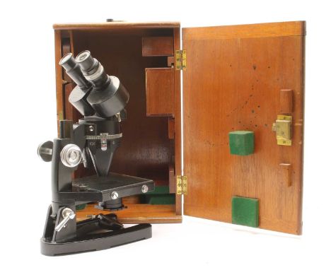 Two binocular microscopes, comprising: the first by Cooke, Troughton &amp; Simms Ltd., M64809, in a wooden box with two spare