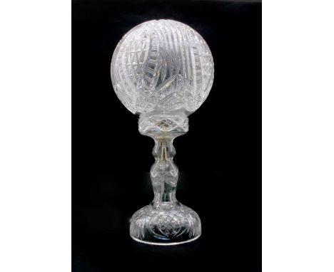 An Art Deco cut glass lamp with cut glass globeCondition report: Some small imperfections, i'e, small nibbles to edges, visib