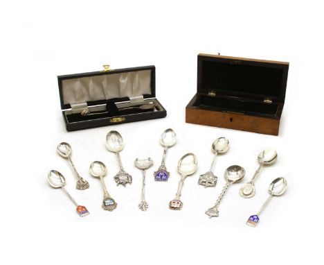 A silver honey spoon, London 1994, the terminal with a honey bee, cased, together with a collection of silver and enamel souv