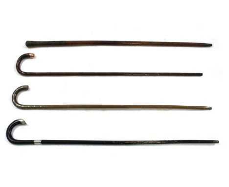 Four walking sticks, comprising: the first with 9ct gold cap on bamboo shaft, the second with silver mounts on ebonised shaft