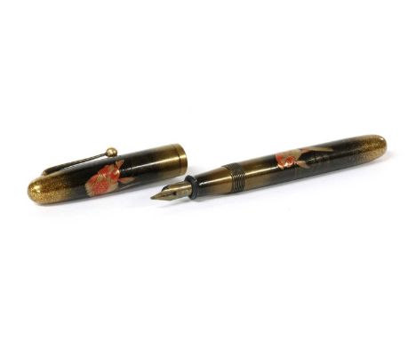 A Dunhill Namiki Maki-e lacquered fountain pen, circa 1930, almost certainly an A-grade example elaborately decorated using s