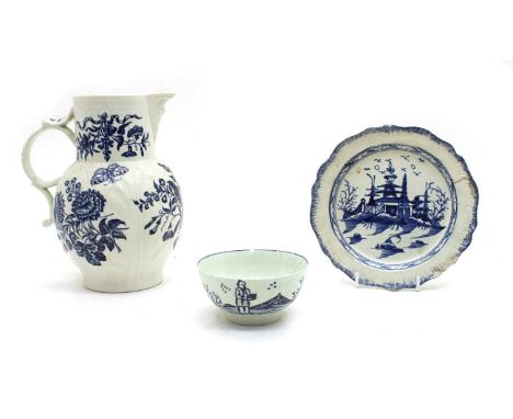 A mid 18th century English porcelain slop bowl, with raised thickly painted figure in a landscape, 11cm diameter, a late 18th