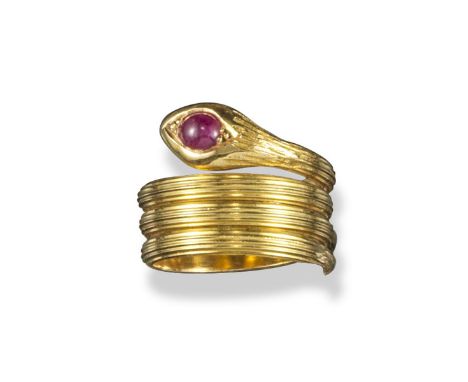 A gold snake ring, the coiled snake with fluted sides and cabochon ruby set to the head. Size K.