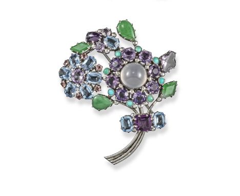 An Arts and Crafts gem-set foliate brooch attributed to Dorrie Nossiter, centred with a circular shaped moonstone within a su