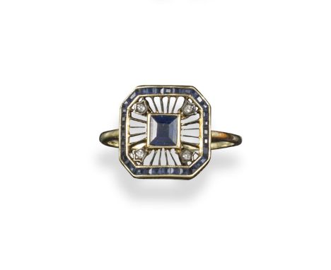 A Russian sapphire and diamond plaque ring by Fabergé, of hexagonal form and set within calibre-cut sapphire surround and pie