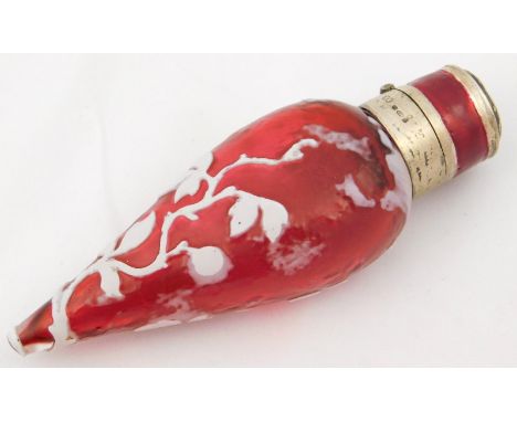 A Continental early 20thC ruby glass scent bottle, of tear drop form, with white floral overlay, silver mounts, import marks,