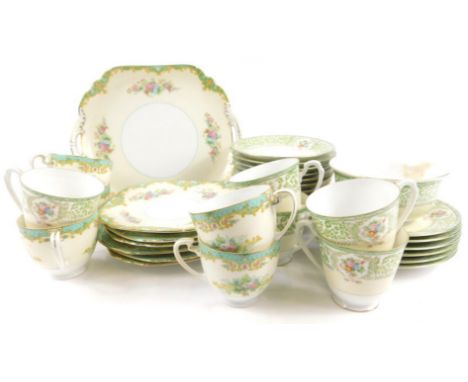 A Noritake part tea service, decorated with leaves and flowers on a blush ivory ground.