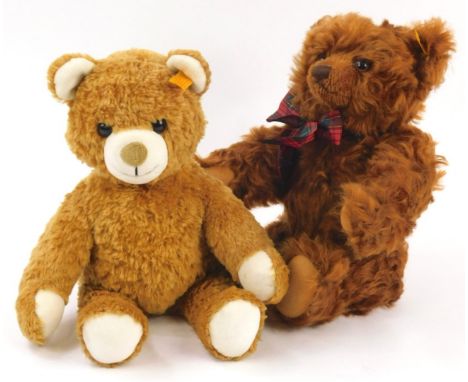 Two Steiff Teddy bears, one wearing a tartan bow in original box and titled Bobby.