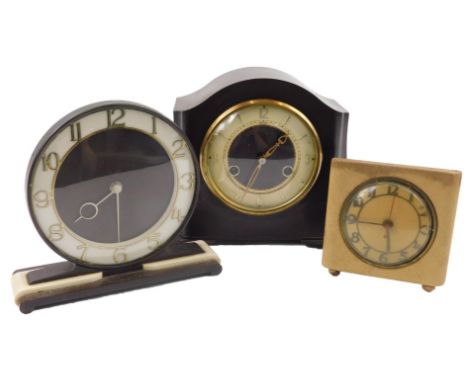 Three Art Deco style mantel clocks, to include two Bakalite type examples, and an electric timepiece.