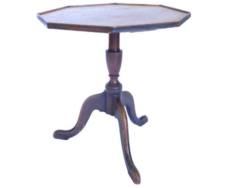 A 19thC mahogany and chequer banded occasional table, the octagonal top on  a turned column and tripod base, 44cm wide. 