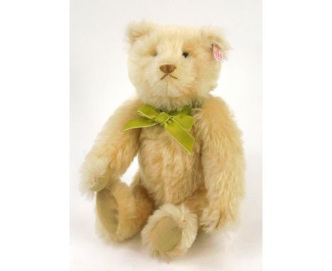 A Steiff George The Memories Bear, with original certificate and box.