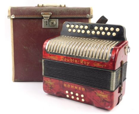 A Hohner Double-Ray piano accordion, in fitted case.
