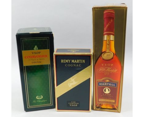 Three bottles of cognac, to include Remy Martin, small bottle Martell medallion and Courvoisier, all boxed.