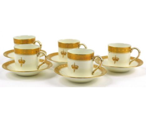 A Royal Worcester part coffee service, decorated with the crest of King Farouk of Egypt. Provenance: a personal present to th