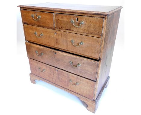 A 19thC oak chest of drawers, the top with a moulded edge above two short, three long drawers, on bracket feet, 94cm wide.
