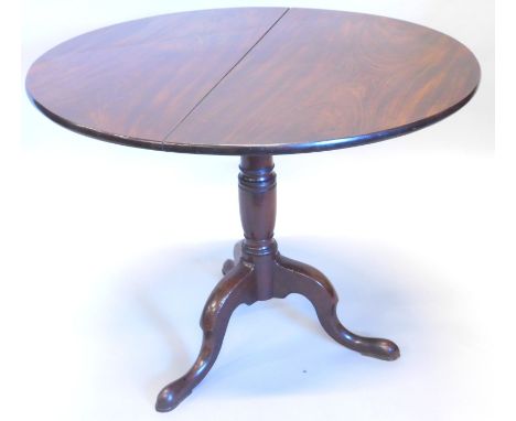 A 19thC walnut occasional table, the circular tilt top on a turned column, tripod base with pad feet, 91cm dia.