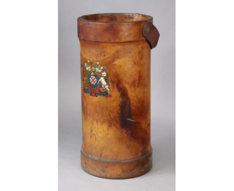 A Victorian-style leather covered ‘powder keg’ stick-stand with transfer-printed coat-of-arms &amp; swing handle, 50.5cm high