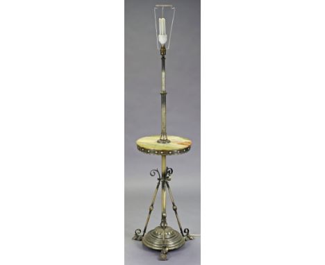 A late Victorian onyx and brass standard lamp with adjustable rise-and-fall column, central platform, and circular stepped ba