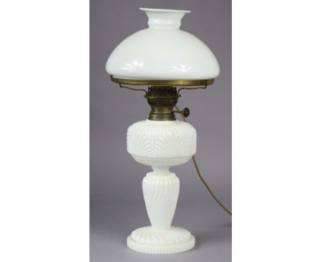 A Victorian opaline glass oil table lamp (converted to electricity) with moulded shell design &amp; spiral-twist column, 56cm