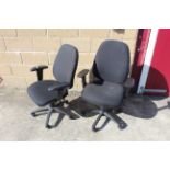 A pair of revolving adjustable office chairs with arm rests SUBJECT TO VAT